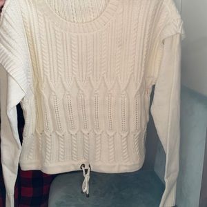 Knitted baggy sweater.